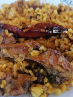 Una foto de Arroz de conejo y pollo de campo