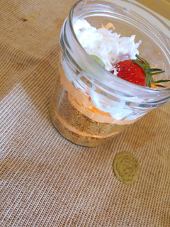 A picture of Reusing leftover cake..Cake in a jar.