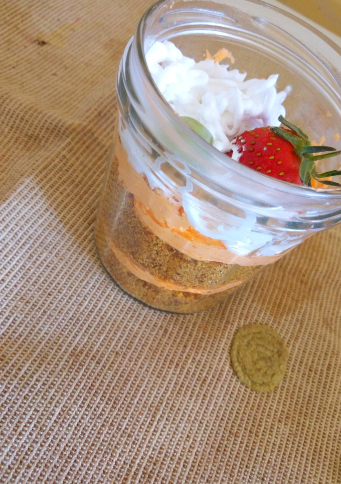 A picture of Reusing leftover cake..Cake in a jar.