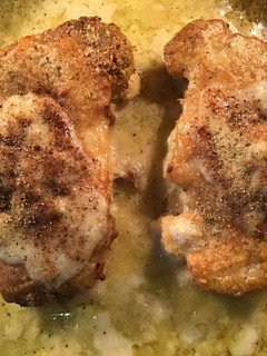 A picture of California Farm Cauliflower Steak in Cashew Cheese Sauce.