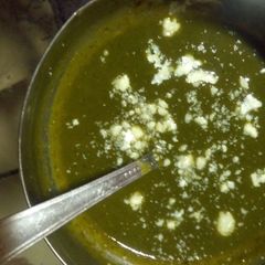 A picture of Hot and sizzling Spinach soup.