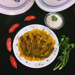 A picture of Radish in Fish Curry (semi dry).