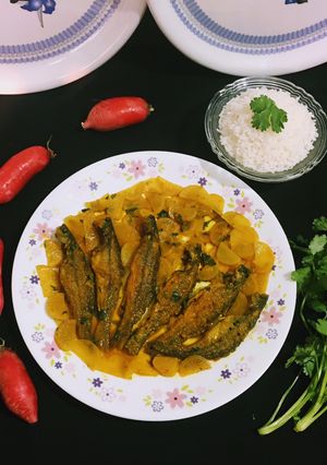 A picture of Radish in Fish Curry (semi dry).