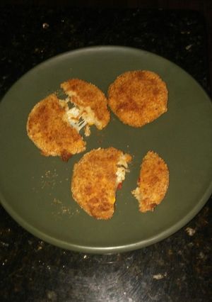 Una foto de Croquetas de arroz con queso y choclo