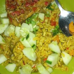 A picture of Jallof rice with veggies.