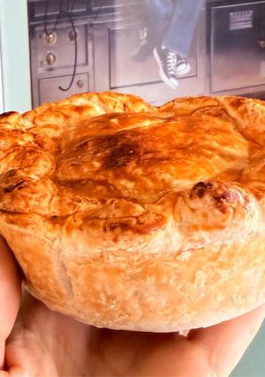 A picture of Lamb Rogan Paratha Pie.