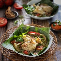 A picture of Chicken Garang Asem - Clay pot.