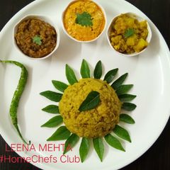 Khichdi with Dahi Tikhari, jeera aloo, baigan chutney A picture of Khichdi with Dahi Tikhari, jeera aloo, baigan chutney.