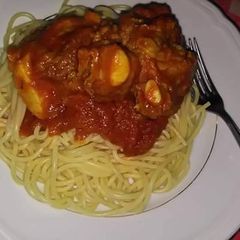 Spagetti with tomato sauce and boiled egg A picture of Spagetti with tomato sauce and boiled egg.