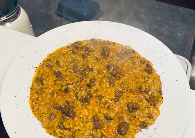 Guida passo passo a Fai Perfetto Risotto Zucca, Salvia e Salsiccia