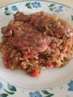 Una foto de Conejo con arroz