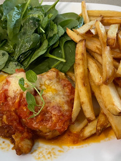 Una foto de Pechuga de pollo parmesana