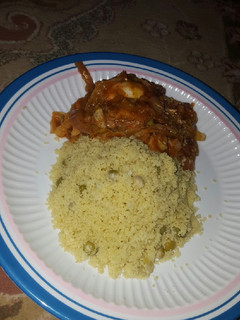 A picture of Cous-cous & vegetable sauce.