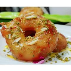 Jalebi donuts with apple filling A picture of Jalebi donuts with apple filling.