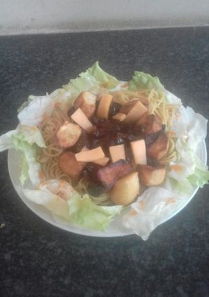A picture of Spaghetti and mushroom.