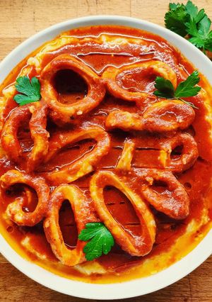 A picture of Seafood Polenta with Stewed Calamari.