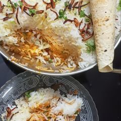 A picture of Vegetable layer biryani.