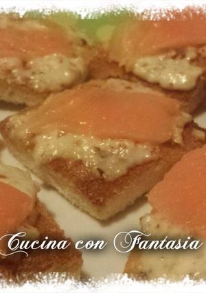 A picture of Bruschetta with Stracchino, Walnuts, and Salmon.