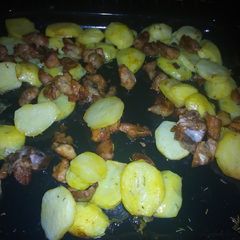 A picture of Pork and rosemary potatoes #AuthorMarathon.