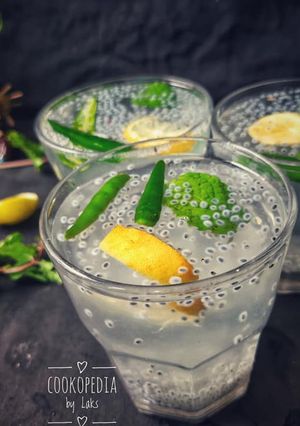 A picture of Kulukki Sarbath A refreshing Basil Lemon ginger chilli drink.