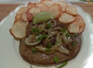 Una foto de Hígado encebollado