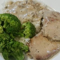 A picture of Pork Chops, Broccolli, Rice, and Mushroom Gravy.