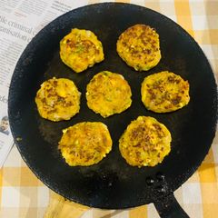A picture of Raw Banana Tikki with sprouts.