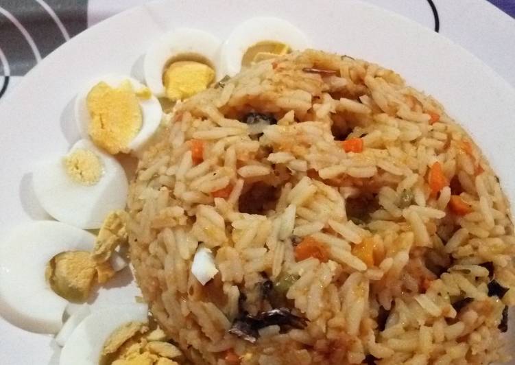 Native Oil Jollof Rice with Boiled Eggs