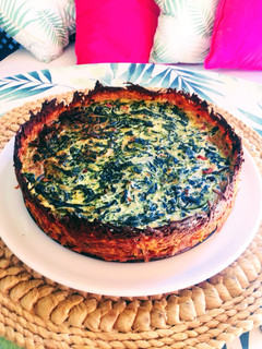 Una foto de Timbal de espinacas con base de boniato