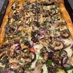 A picture of Seasonal Vegetable and pesto puff pastry tart.