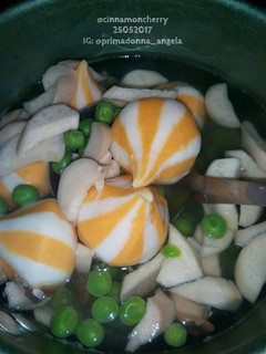 A picture of Clear Soup with Cheese Balls and King Oyster Mushroom.