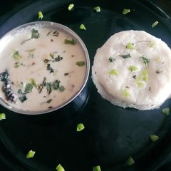 A picture of Healthy tasty peanut powder Gujarati farali curry(Kadhi) with Sama rice.