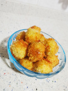 Una foto de Palomitas de pollo con queso