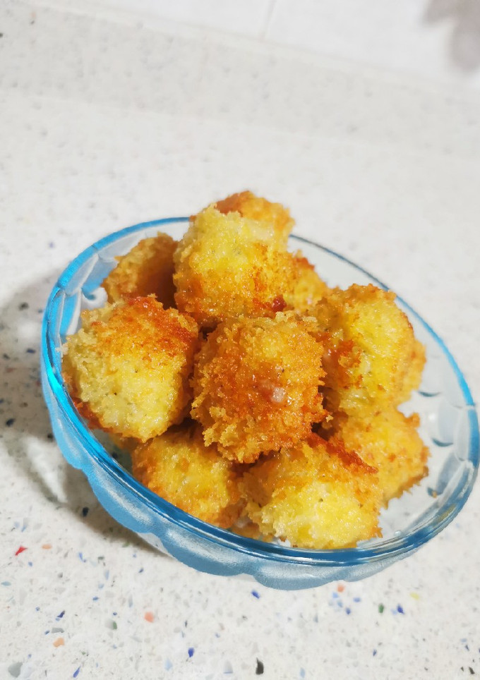 Una foto de Palomitas de pollo con queso