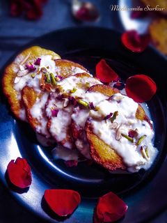 রাবড়ি মালপোয়া (rabri malpua recipe in Bengali) রেসিপির প্রধান ছবি