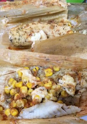 Una foto de Tamal de pescado y pollo