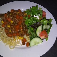 A picture of Pasta with Green Salad.