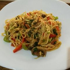 A picture of Fried noodle with egg and vegetables.