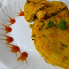 A picture of Moong Dal & semolina chila with paneer stuffing.