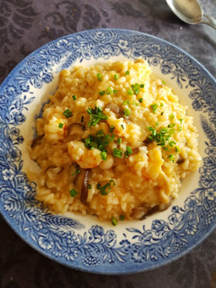 Una foto de Risotto de gambas y setas