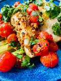 Fish with chargrilled garlic tomatoes and lemon olive oil dressing