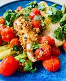 Fish with chargrilled garlic tomatoes and lemon olive oil dressing