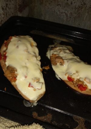 Una foto de Berenjena rellena con soja texturizada