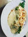 Hojas de col rellenas de variado de verdura y secreto ibérico