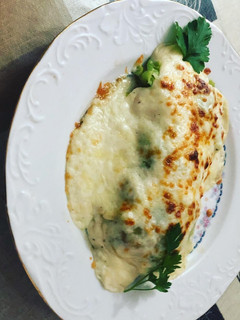 Una foto de Hojas de col rellenas de variado de verdura y secreto ibérico