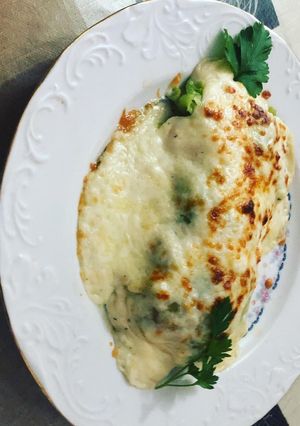 Una foto de Hojas de col rellenas de variado de verdura y secreto ibérico