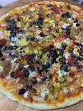 Pizza grand format aux fruits de mer