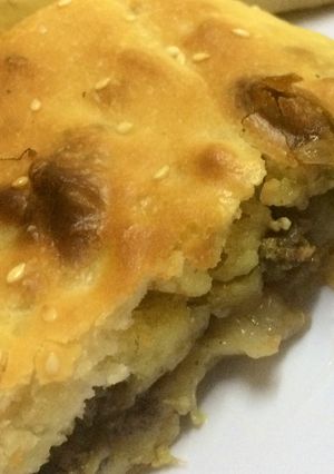 صورة لوصفة فطيرة بخلطة اللحم والدجاج