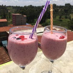 A picture of Raspberries, blueberries and pineapple smoothie.