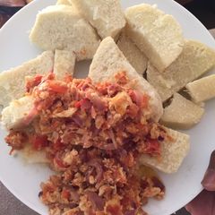 A picture of Boiled yam and egg sauce.